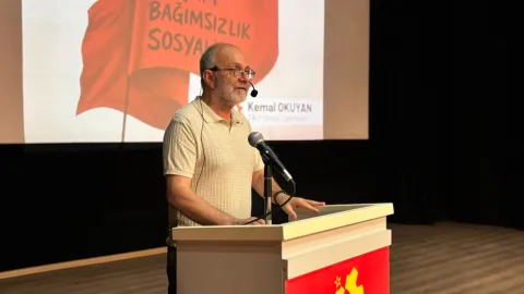 TKP Genel Sekreteri Kemal Okuyan konuşma yaparken